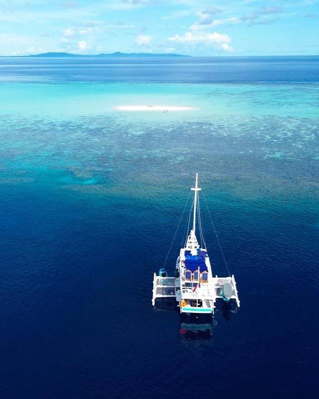 TogeanVoyage boat - on the water